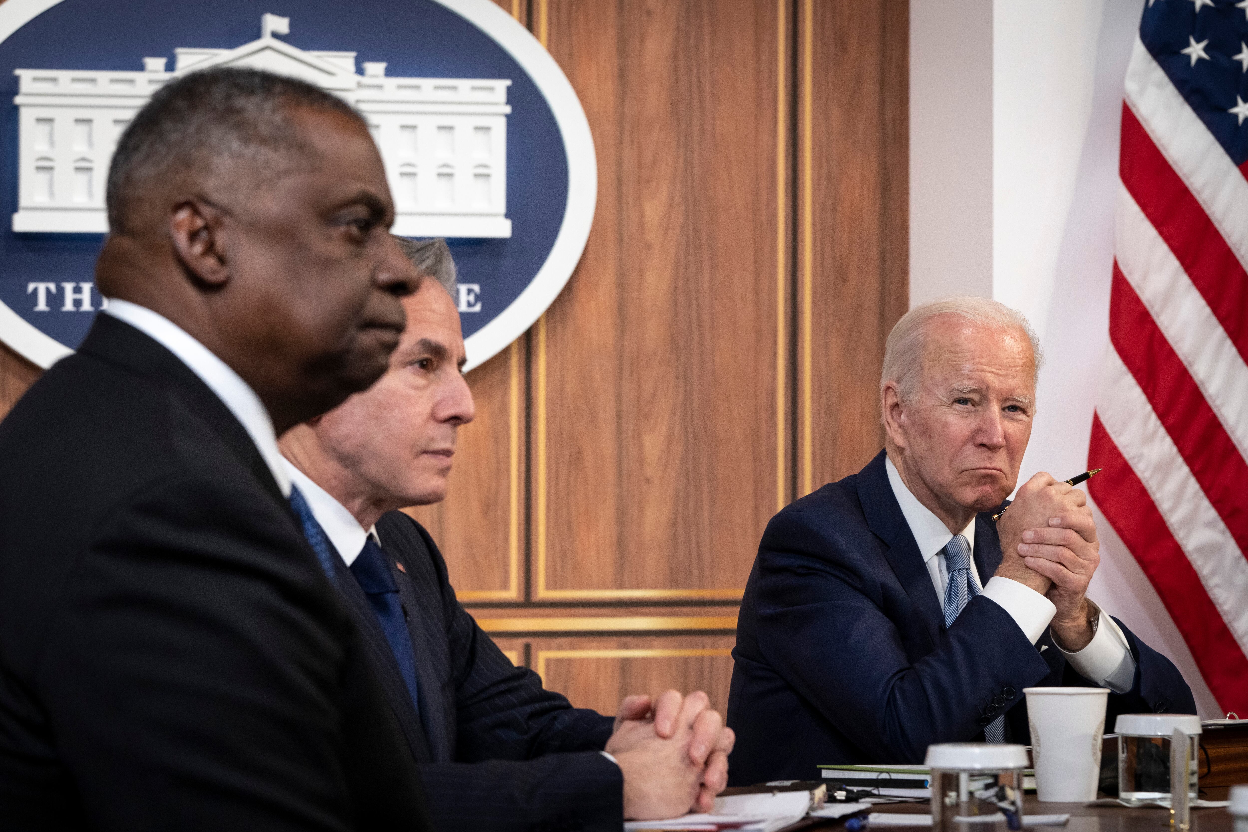 U.S. Defense Secretary Lloyd Austin, Secretary of State Antony Blinken and President Joe Biden listen as Prime Minister of India Narendra Modi speaks during a virtual meeting at the White House in April 2022.