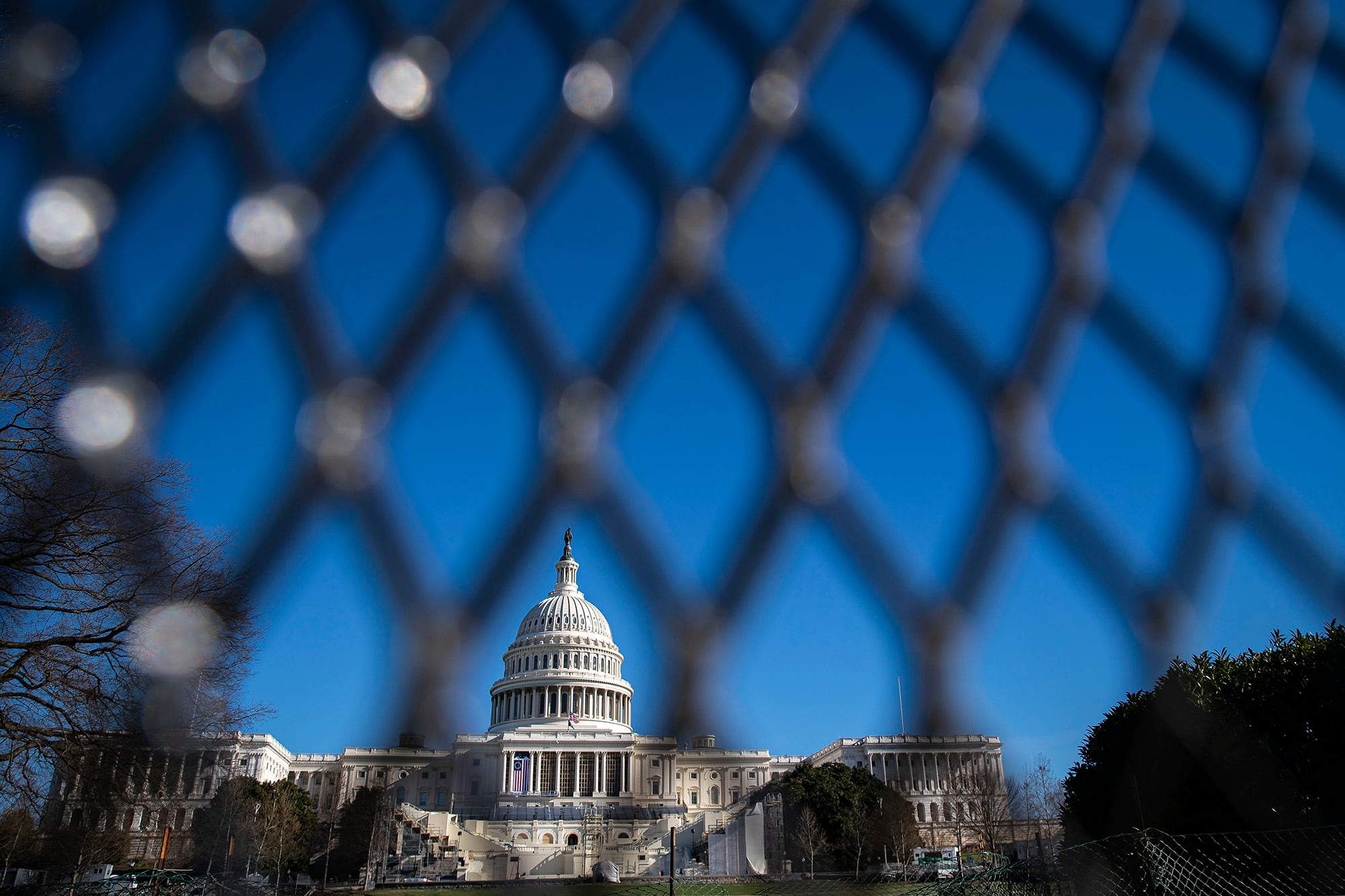 The U.S. Capitol is seen behind security fencing on Jan. 9, 2021, in Washington.