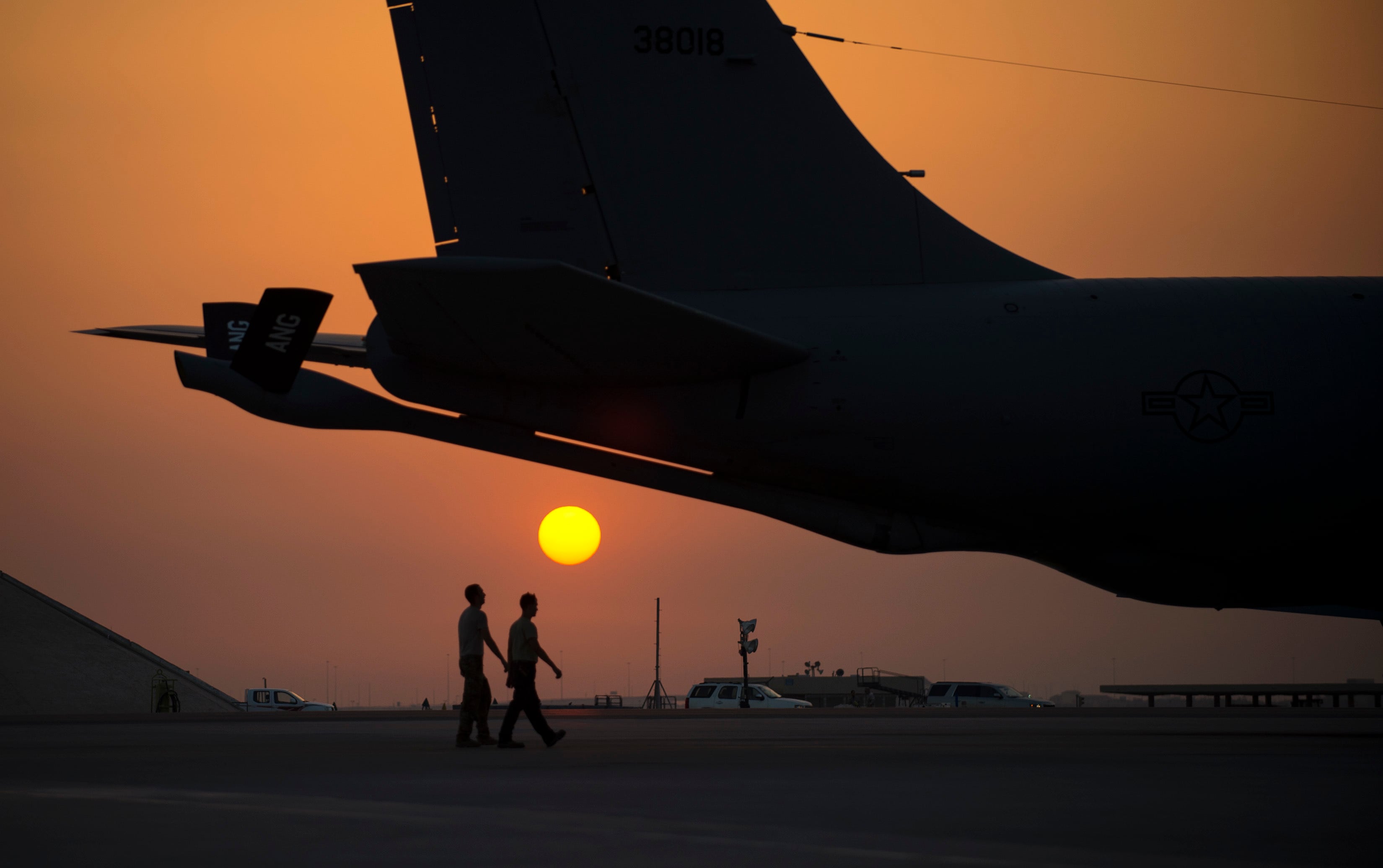 Airmen with the 379th Expeditionary Aircraft Maintenance Squadron prepare to conduct a pre-flight check on a KC-135 Stratotanker at Al Udeid Air Base, Qatar, June 8, 2017.