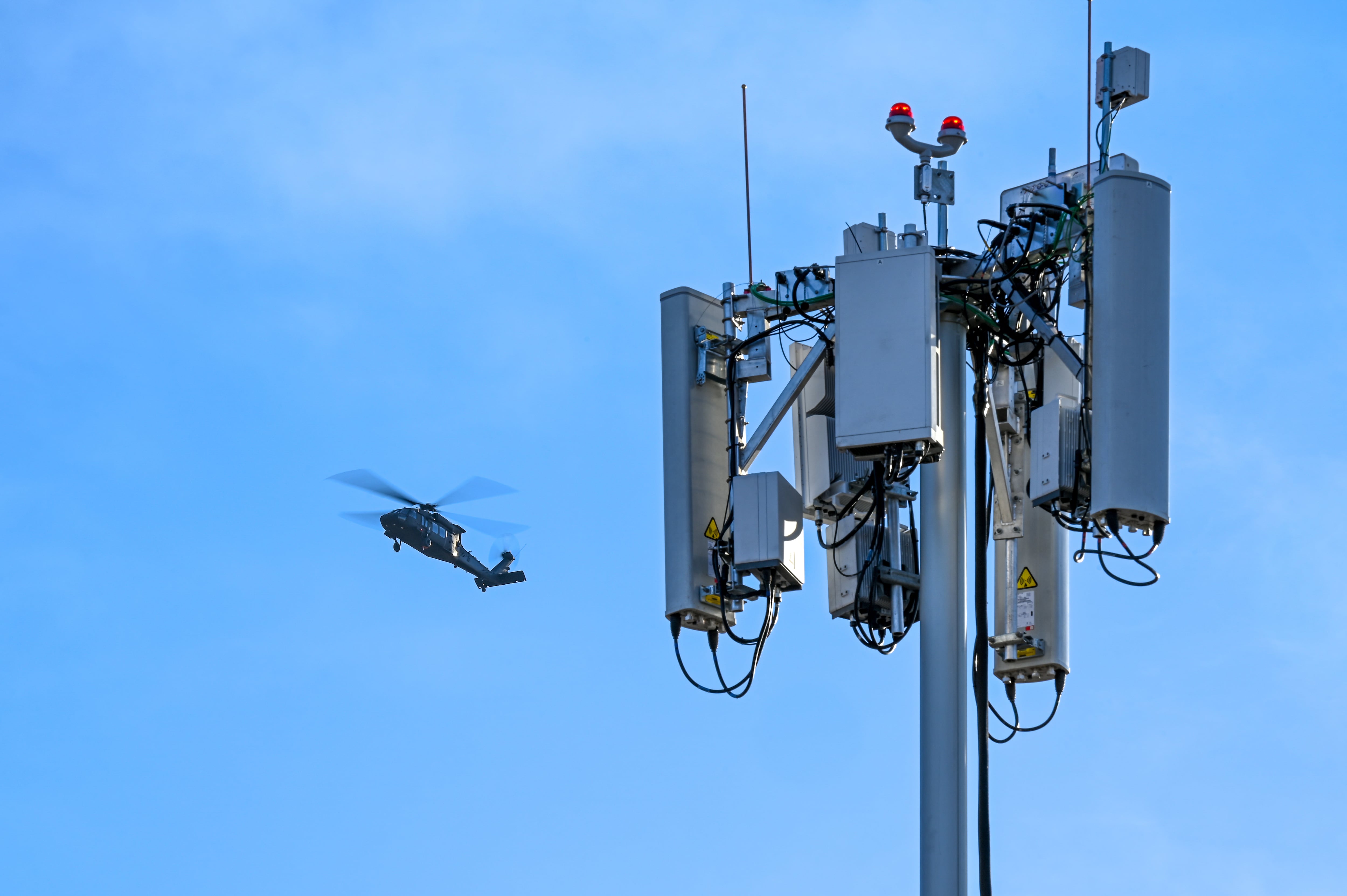 An UH-60 Blackhawk flies multiple passes at different altitudes over the runway during a series of 5G avionics tests March 2, 2022, at Hill Air Force Base, Utah.