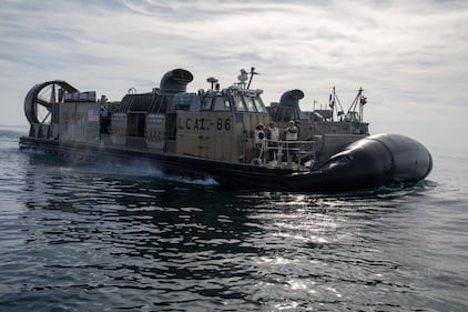 Sailors operate landing craft air cushions during recovery efforts of a high-altitude balloon in the Atlantic Ocean, Feb. 8, 2023.