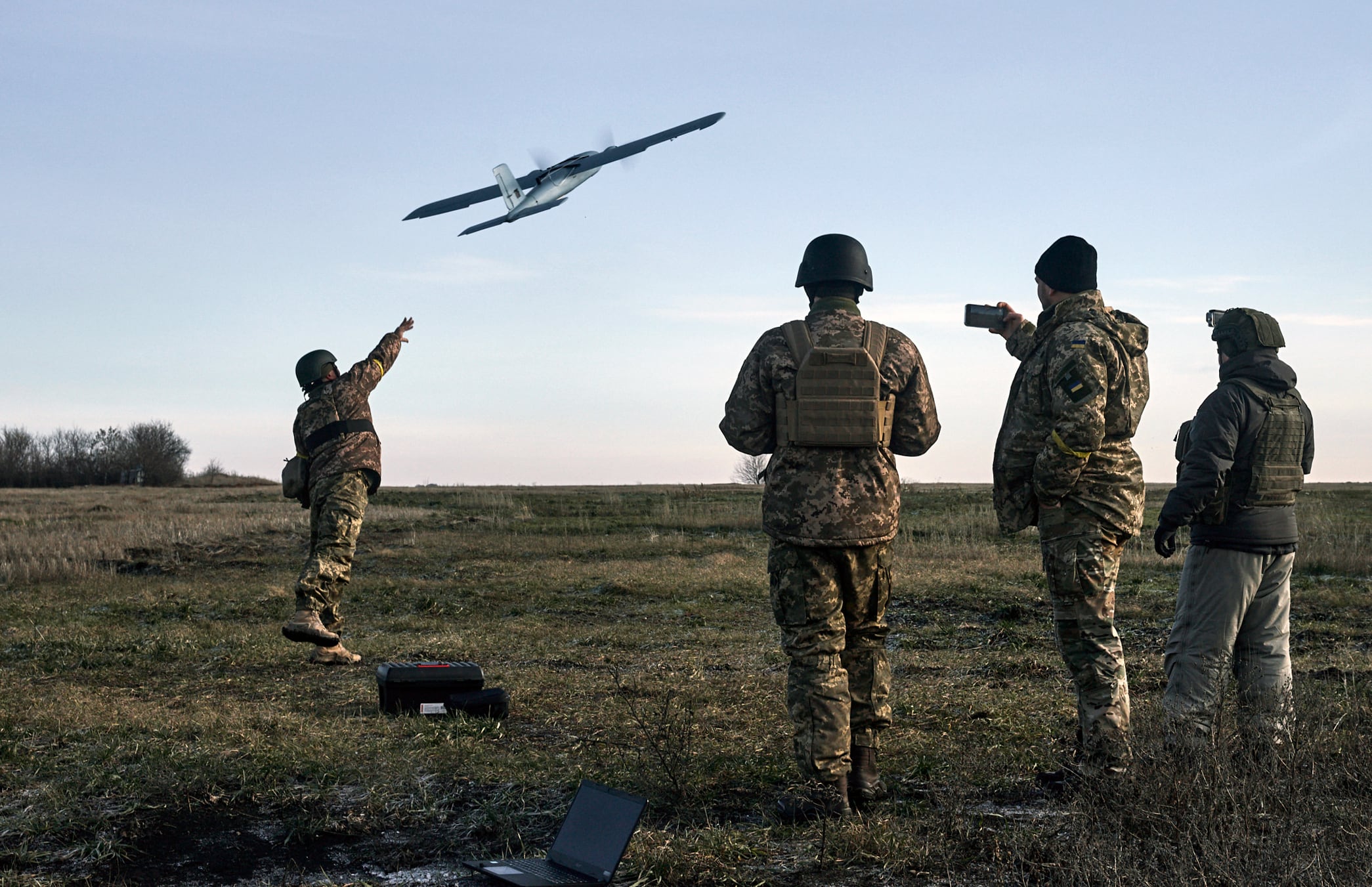 Ukrainian soldiers launch a drone at Russian positions near Bakhmut, Donetsk region, Ukraine, Thursday, Dec. 15, 2022.