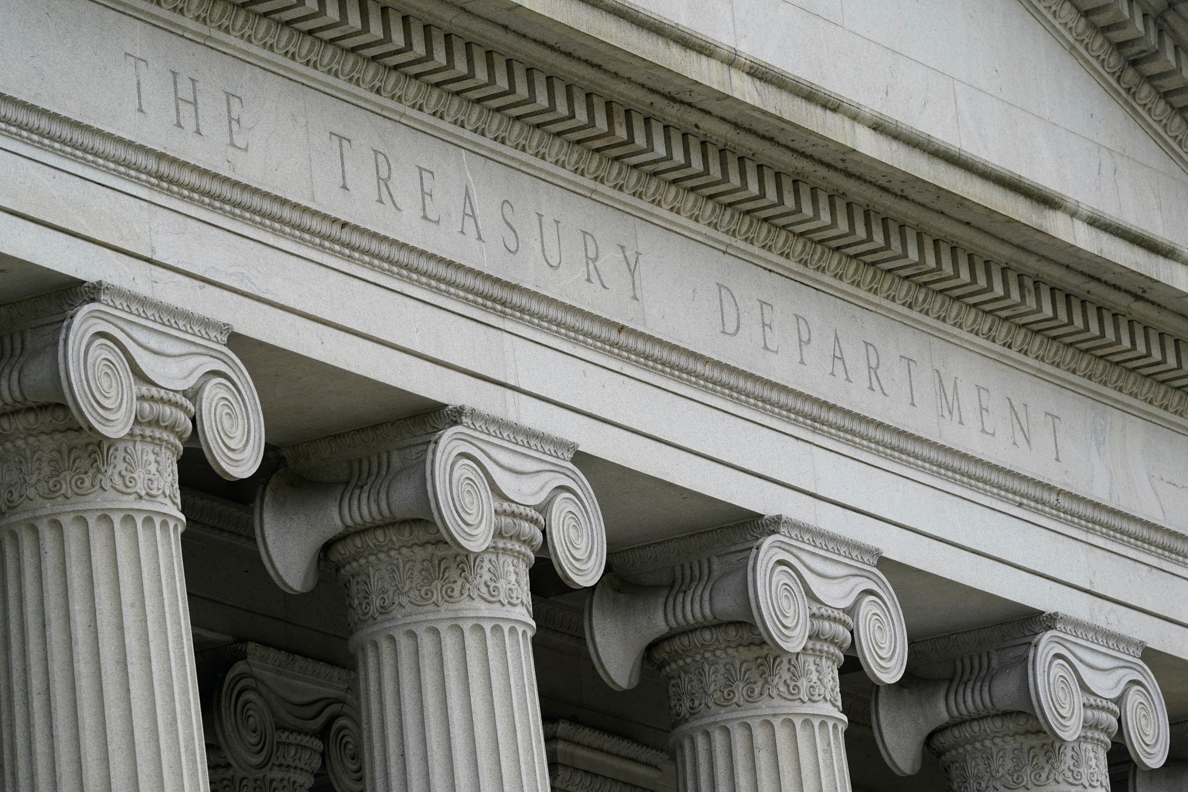 The Treasury Building is viewed in Washington, May 4, 2021. The U.S. on Thursday imposed sanctions on a group of individuals, firms and vessels connected to an oil smuggling outfit said to benefit the Lebanese militant group Hezbollah and Iran's Revolutionary Guard Corps. (AP Photo/Patrick Semansky, File)