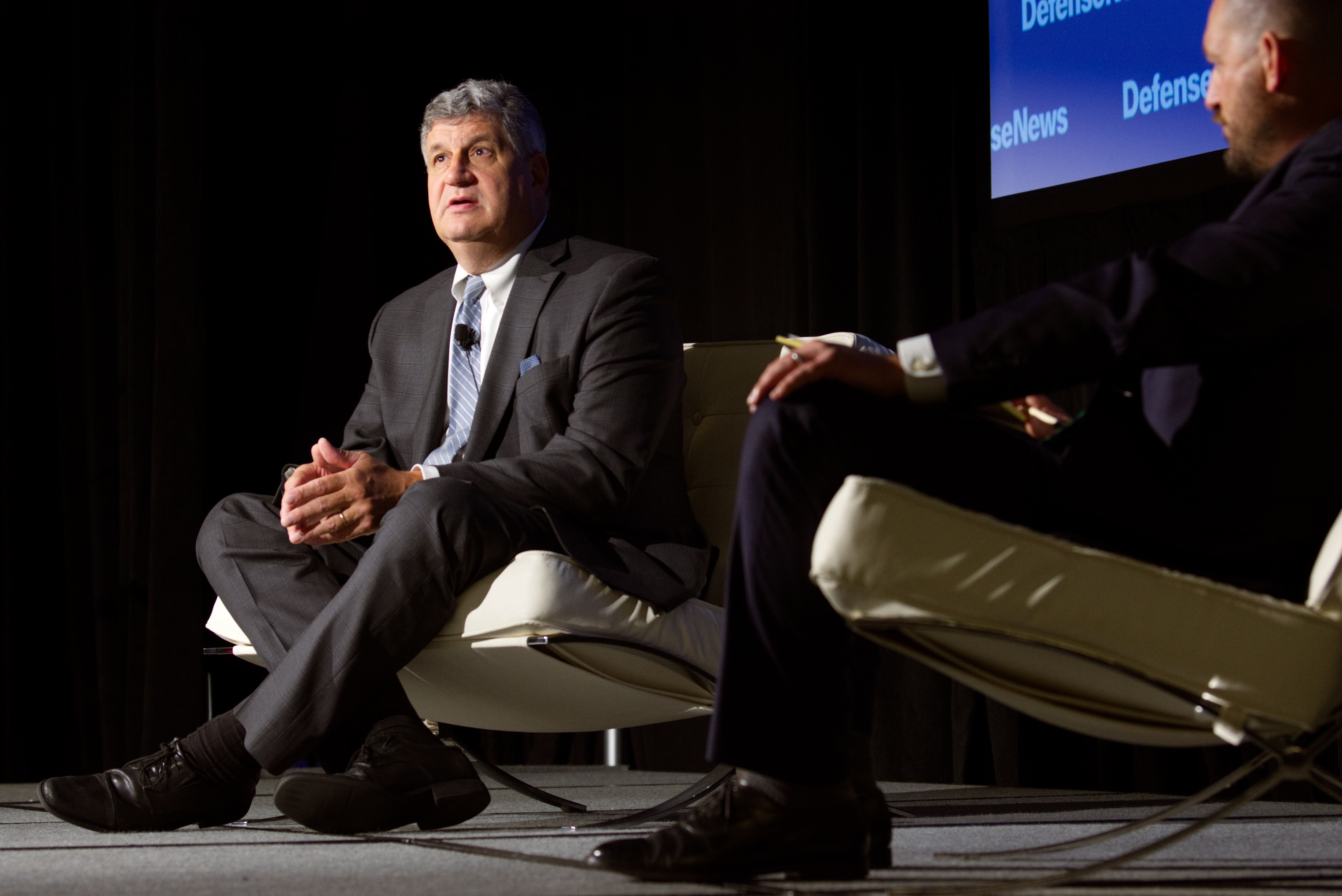 Bill LaPlante, the undersecretary of defense for acquisition and sustainment, answers a question on stage Sept. 7, 2022, during the Defense News Conference in Pentagon City.